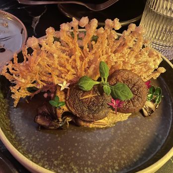 Kissa - a plate of food on a table - Lounges Near Me - Toronto, Ontario
