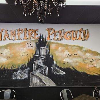 Vampire Penguin - Painted on the wall - Desserts Near Me - Brunswick, Georgia