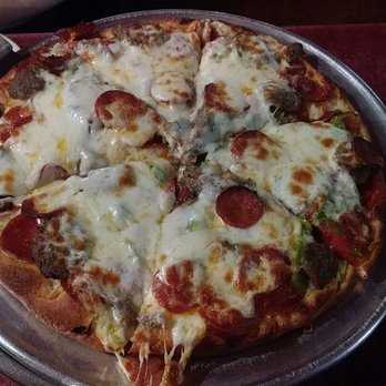 D'Aurelios - Thick crust, heavy cheese, Alfredo sauce pepperoni and linguica, sliced meat balls green peppers. Delicious. - Pizza Near Me - Fort Bragg, California