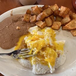 Huevos Rancheros Plate / Potatoes hard as rocks Huevos Rancheros Plate / Potatoes hard as rocks