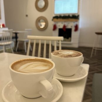 Little Tina - two cups of coffee on a table - Coffee & Tea Near Me - Tampa, Florida Little Tina - two cups of coffee on a table - Coffee & Tea Near Me - Tampa, Florida