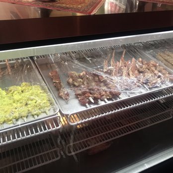 Caspian Grill - Marinating meat - Mediterranean Near Me - Madison, Wisconsin Caspian Grill - Marinating meat - Mediterranean Near Me - Madison, Wisconsin