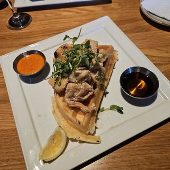 Rebel Food & Drink - half of chicken waffle - Wine Bars Near Me - Edmonton, Alberta Rebel Food & Drink - half of chicken waffle - Wine Bars Near Me - Edmonton, Alberta