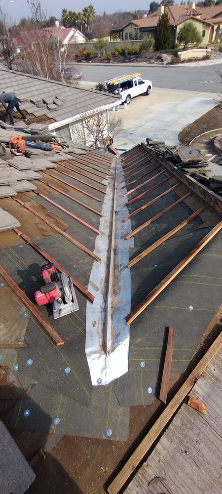 Slide of Echevarria Roofing