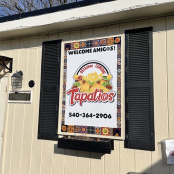 Tapatios - a sign on the side of a building - Tacos Near Me - Marshall, Virginia