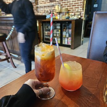 Pavirin Thai Bistro - My Thai Iced Tea on the left and my friends pretty alcoholic drink (forgot the name!) on the right. - Thai Near Me - Hicksville, New York Pavirin Thai Bistro - My Thai Iced Tea on the left and my friends pretty alcoholic drink (forgot the name!) on the right. - Thai Near Me - Hicksville, New York