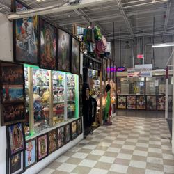 Bonanza Indoor Swapmeet - As you walk down the hallway, you'll see the "Restrooms" sign. The shop is in front of here . Space F17