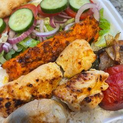 North Park Produce - CHICKEN KABOB PLATE with rice, flatbread, and cucumber, onion, and tomato salad