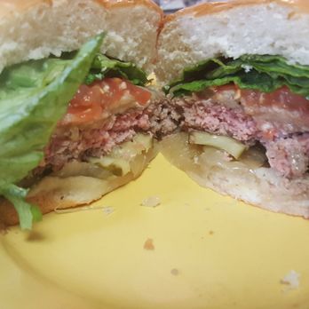BGR Burgers Grilled Right - Medium rare bacon cheeseburger with pepper jack, lettuce, tomato, pickles, caramelized onions and banana peppers (cut open). - Burgers Near Me - Columbia, Maryland BGR Burgers Grilled Right - Medium rare bacon cheeseburger with pepper jack, lettuce, tomato, pickles, caramelized onions and banana peppers (cut open). - Burgers Near Me - Columbia, Maryland