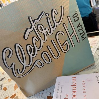 Electric Dough Pizza Co. - The pretty carry out bag has the same color-way as the restaurant. Details! - Pizza Near Me - Jacksonville, Florida Electric Dough Pizza Co. - The pretty carry out bag has the same color-way as the restaurant. Details! - Pizza Near Me - Jacksonville, Florida