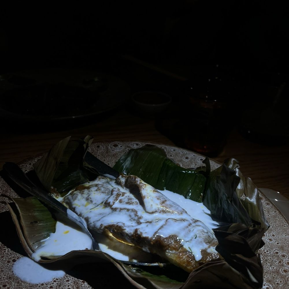 The Tyger - Roasted sea Steamed Hybrid Striped Bass in Banana Leaf - Cocktail Bars Near Me - New York, New York The Tyger - Roasted sea Steamed Hybrid Striped Bass in Banana Leaf - Cocktail Bars Near Me - New York, New York