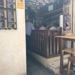 Taberna Jose - Locals blowing smoke in your face while you eat
