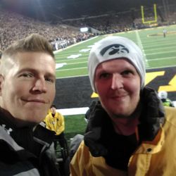 Compassus - Nathan with his brother at a Hawkeye game.
