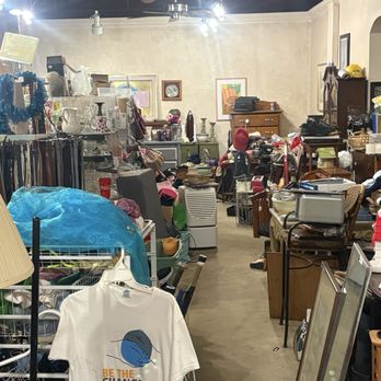 Thrift City - Random stuff stacked up everywhere. Not shown-piles of clothes in a dark room. - Thrift Stores Near Me - Marietta, Georgia Thrift City - Random stuff stacked up everywhere. Not shown-piles of clothes in a dark room. - Thrift Stores Near Me - Marietta, Georgia