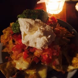 Lo de Nacho - Nacho con queso, guacamole, tomate, etc