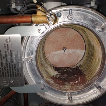 Amour Mechanical Services - Inside of dirty high efficient boiler - Plumbing Near Me - Edmonton, Alberta Amour Mechanical Services - Inside of dirty high efficient boiler - Plumbing Near Me - Edmonton, Alberta