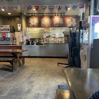 Sports Nut Pizza - Able to look at the large menu above the cashier when ordering - Pizza Near Me - Norco, California Sports Nut Pizza - Able to look at the large menu above the cashier when ordering - Pizza Near Me - Norco, California