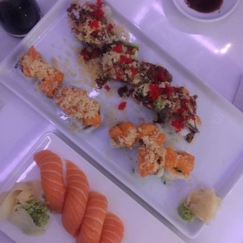 Friends Sushi Izakaya - From bottom to top of photo: Salmon nigiri, angry girlfriend maki, fire dragon maki - Sushi Bars Near Me - Chicago, Illinois Friends Sushi Izakaya - From bottom to top of photo: Salmon nigiri, angry girlfriend maki, fire dragon maki - Sushi Bars Near Me - Chicago, Illinois