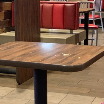 Love's Travel Stop - a table and chairs in a restaurant - Gas Stations Near Me - Canton, Mississippi