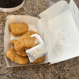 We ordered nuggets and got an already eaten one where someone ate it!!! We ordered nuggets and got an already eaten one where someone ate it!!!