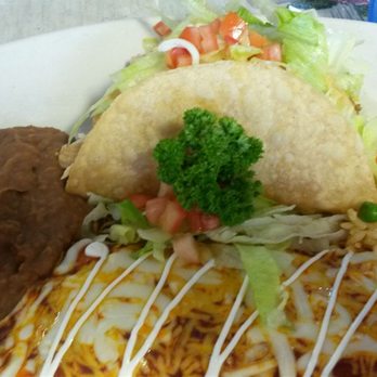 Rita's Cantina Mexican Kitchen - Combo #1 1 cheese enchilada, 1 beef taco, 1 chicken taco plus beans and rice on the side. - Mexican Near Me - Pinehurst, Texas Rita's Cantina Mexican Kitchen - Combo #1 1 cheese enchilada, 1 beef taco, 1 chicken taco plus beans and rice on the side. - Mexican Near Me - Pinehurst, Texas