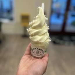 Pineapple Whip with coconut flakes