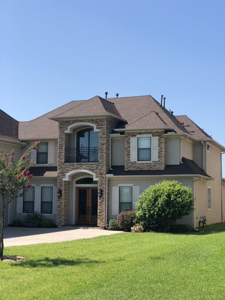 Slide of Cayne Roofing