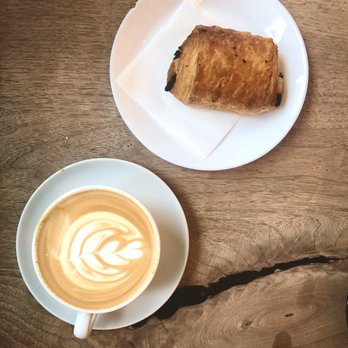 Versus Coffee - Chocolate croissant + flat white - Coffee & Tea Near Me - Toronto, Ontario Versus Coffee - Chocolate croissant + flat white - Coffee & Tea Near Me - Toronto, Ontario