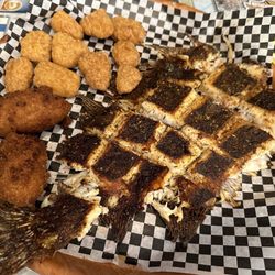 Fiddler's steam House & Oyster Bar - Grilled trout, corn nuggets and hush puppies
