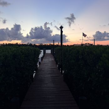 Gasparilla Getaways - Bay House Dock at sunrise - Vacation Rentals Near Me - Placida, Florida Gasparilla Getaways - Bay House Dock at sunrise - Vacation Rentals Near Me - Placida, Florida