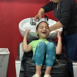 Riverwalk Barbershop - Queen treatment for this tiny person. Who doesn't love a great shampoo by a skilled stylist?!