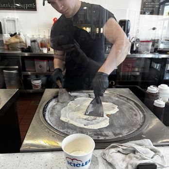 Icicles - Our nice server rolling our ice cream - Desserts Near Me - Newark, California Icicles - Our nice server rolling our ice cream - Desserts Near Me - Newark, California