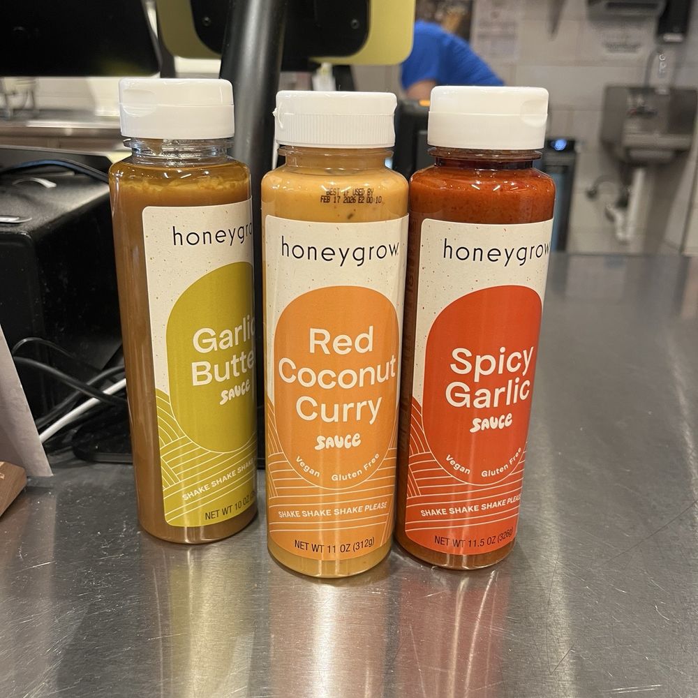 honeygrow - Take home sauces (Garlic Butter Sauce (contains dairy) (bottle) Red Coconut Curry Sauce (v, gf) (bottle) Spicy Garlic Sauce (v, gf) (bottle) - Salad Near Me - Rockville, Maryland
