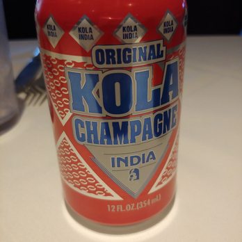 La Marginal - Enjoying a KOLA champagne - Puerto Rican Near Me - San Antonio, Texas