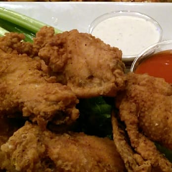Normandy Park Ale House - Dry chicken wings with the buffalo sauce on the side at Normandy Park Ale House - New American Near Me - Normandy Park, Washington