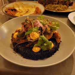Tía Dora - Shrimp with black rice.