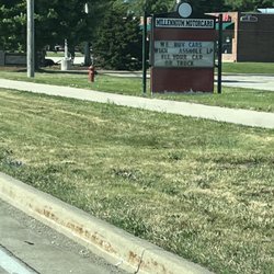 Millennium Motorcars - My 7yo was trying to read this sign right on 47. This is inappropriate and severely unprofessional.