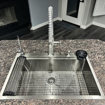 Evolve & Restore -  stainless steel sink in a kitchen - Demolition Services Near Me