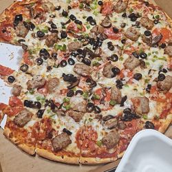 Jailhouse Saloon, LLC - Supermax thin crust pizza