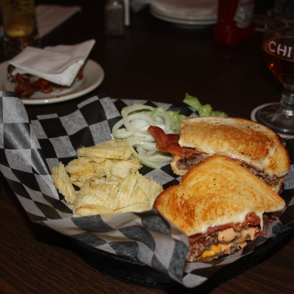 Frisco Burger, American and Swiss Cheese, Bacon and thousand Island dressing on sour dough bread.