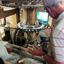 Talgarth Mill - The internal view of the Wheel Mechanism with our Tour Guide