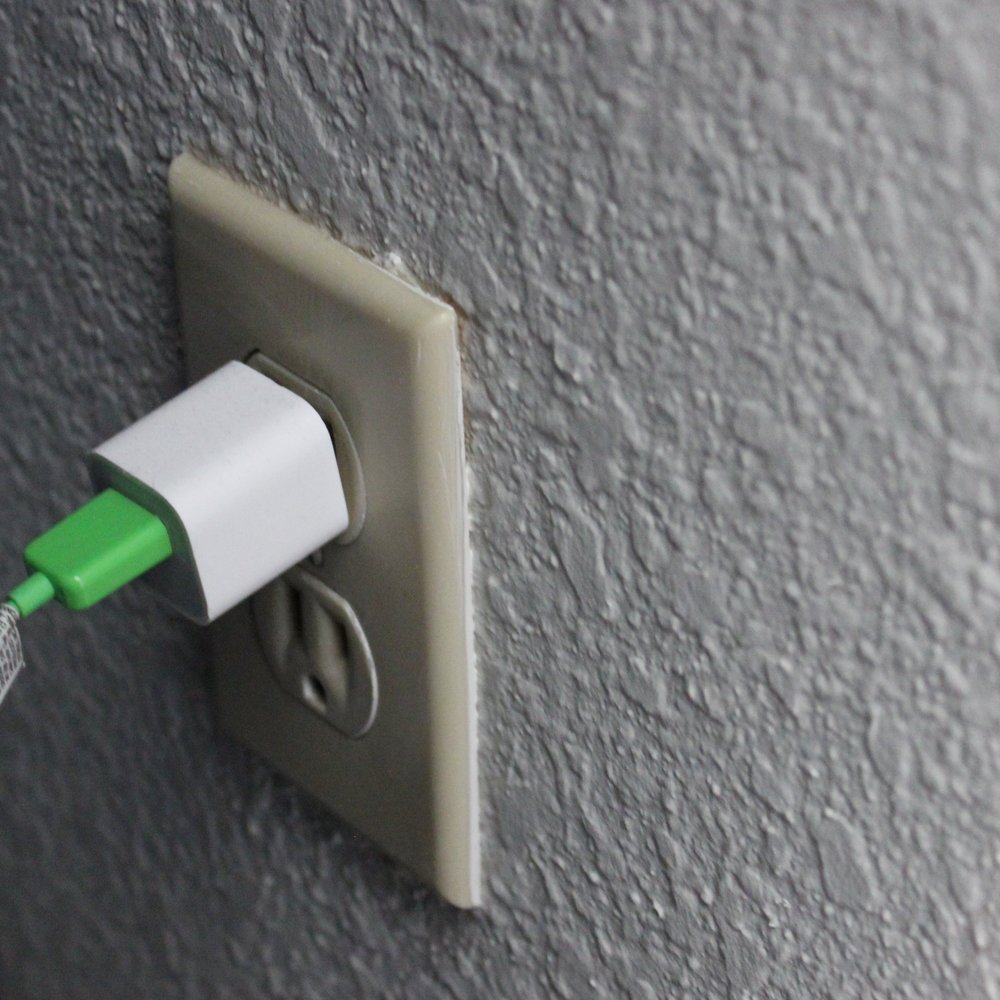 Verde Apartments - You may not be able to tell but that charger is slipping off this amazing electrical plug, great! (sarcasm) - Apartments Near Me - San Jose, California Verde Apartments - You may not be able to tell but that charger is slipping off this amazing electrical plug, great! (sarcasm) - Apartments Near Me - San Jose, California