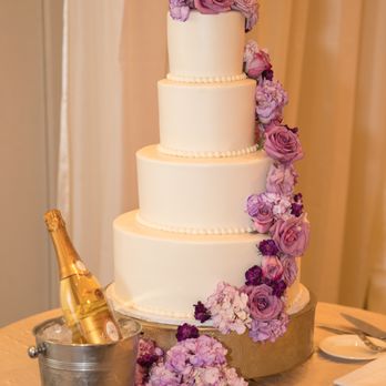 Takes The Cake - Almond buttercream on the outside with fresh flowers. Inside: white cake with strawberry mousse & lemon cake with raspberry & lemon mousse - Bakeries Near Me - Pasadena, California Takes The Cake - Almond buttercream on the outside with fresh flowers. Inside: white cake with strawberry mousse & lemon cake with raspberry & lemon mousse - Bakeries Near Me - Pasadena, California
