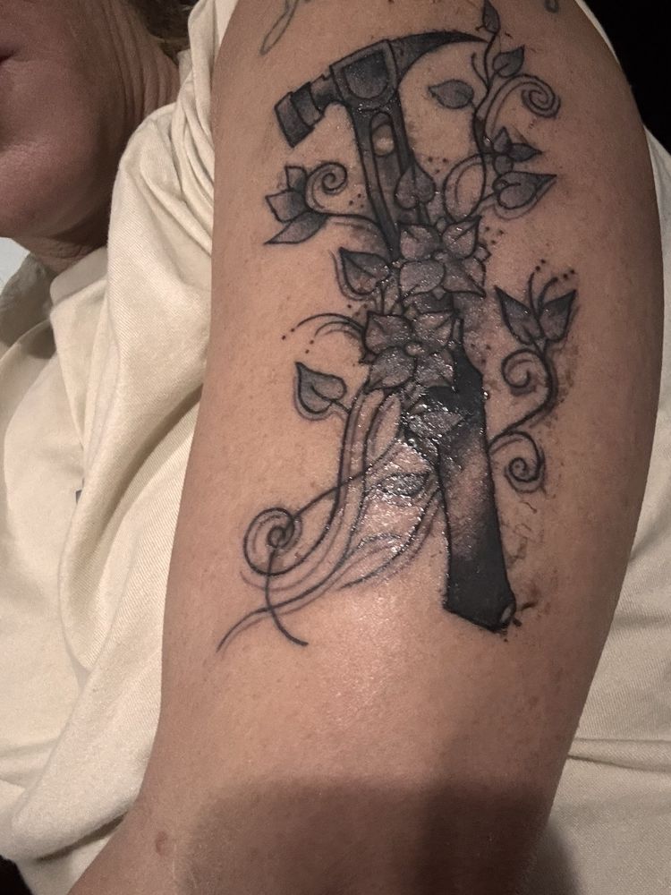 Jim's Tattoo Studio Logo