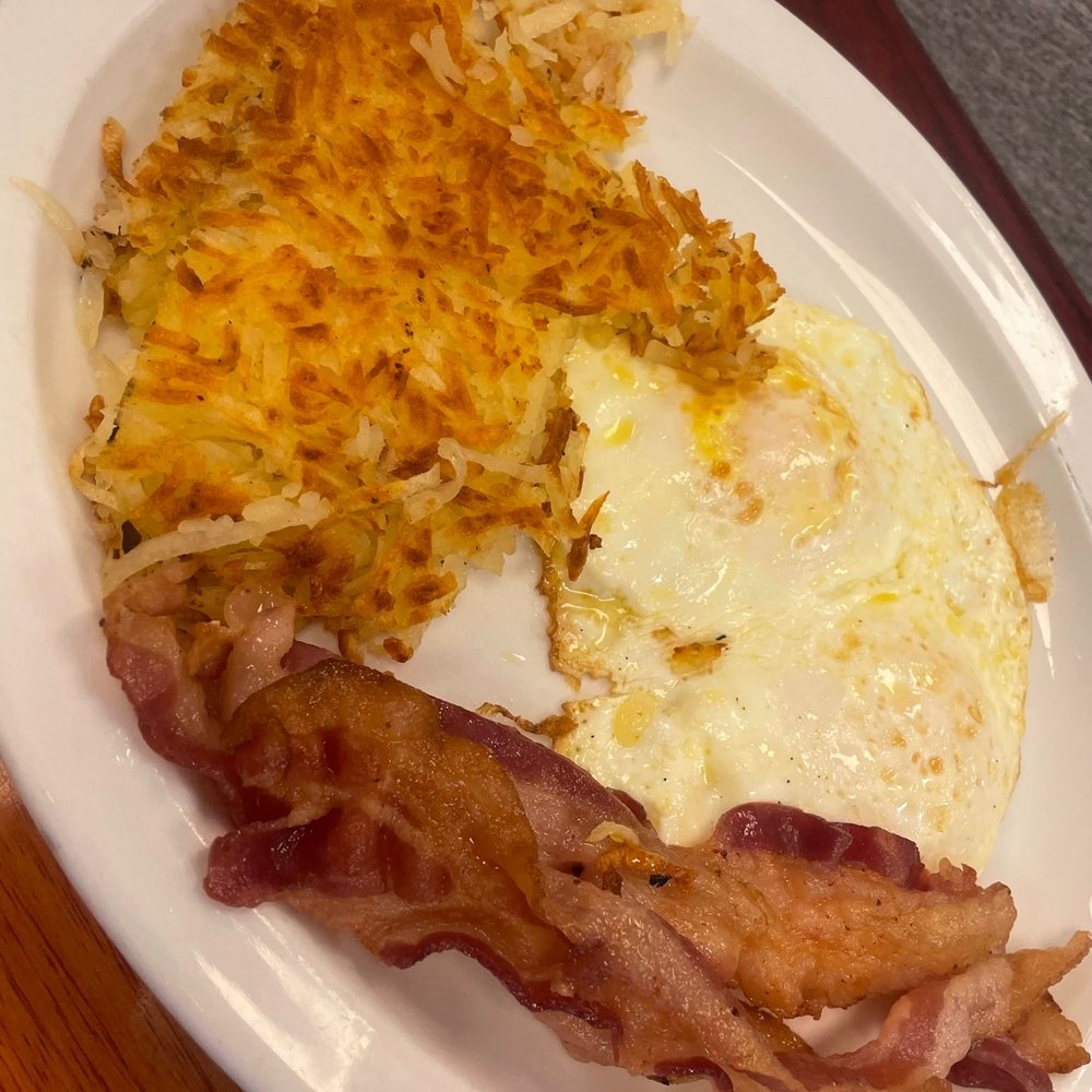 Sunnyside Cafe - Hashbrowns eggs and bacon (bacon a bit undercooked) - Cafes Near Me - Melbourne Beach, Florida Sunnyside Cafe - Hashbrowns eggs and bacon (bacon a bit undercooked) - Cafes Near Me - Melbourne Beach, Florida