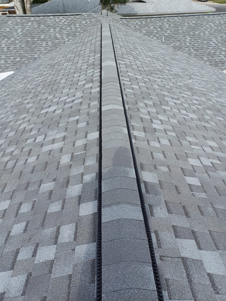 Slide of Dunedin Roofing