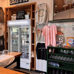 Greenwood Brewing - Bar view canned drinks in the fridge