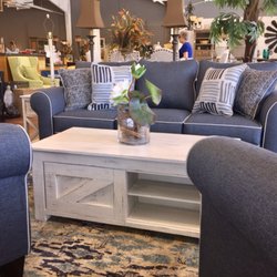 Main Street Home - Newly arrived sofa, matching chairs and rustic coffee table.