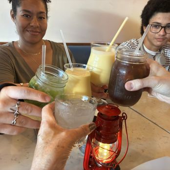 Roots Indian Bistro - Some of us! Refreshing Lemonade Mango Lassi, Grandson had a cocktail that he enjoyed. I had to drive so no alcohol for me! - Indian Near Me - Los Angeles, California