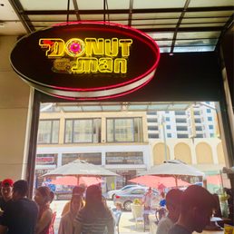 Exterior outside entrance of The Donut Man - Scenery inside of Grand Central Market - Los Angeles, California Exterior outside entrance of The Donut Man - Scenery inside of Grand Central Market - Los Angeles, California